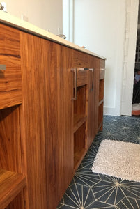 Custom woodwork building a solid pecan vanity for a residential project