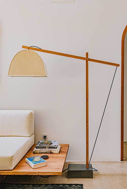 The Skye lamp in full-view with its cantilevered arm and American canvas shade.