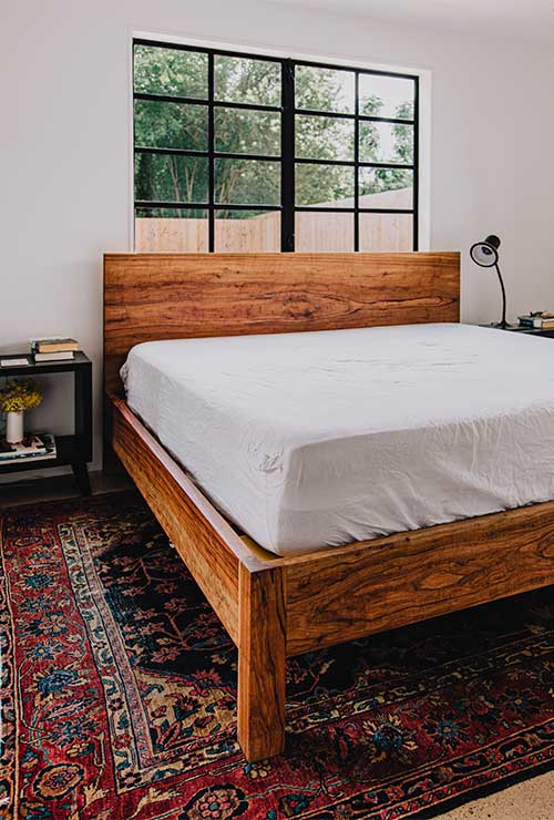 The integrity of the grain of the Taylor bed's full-slab American pecan. Each slab is responsibly sourced from a family-run mill just outside of Austin, Texas.